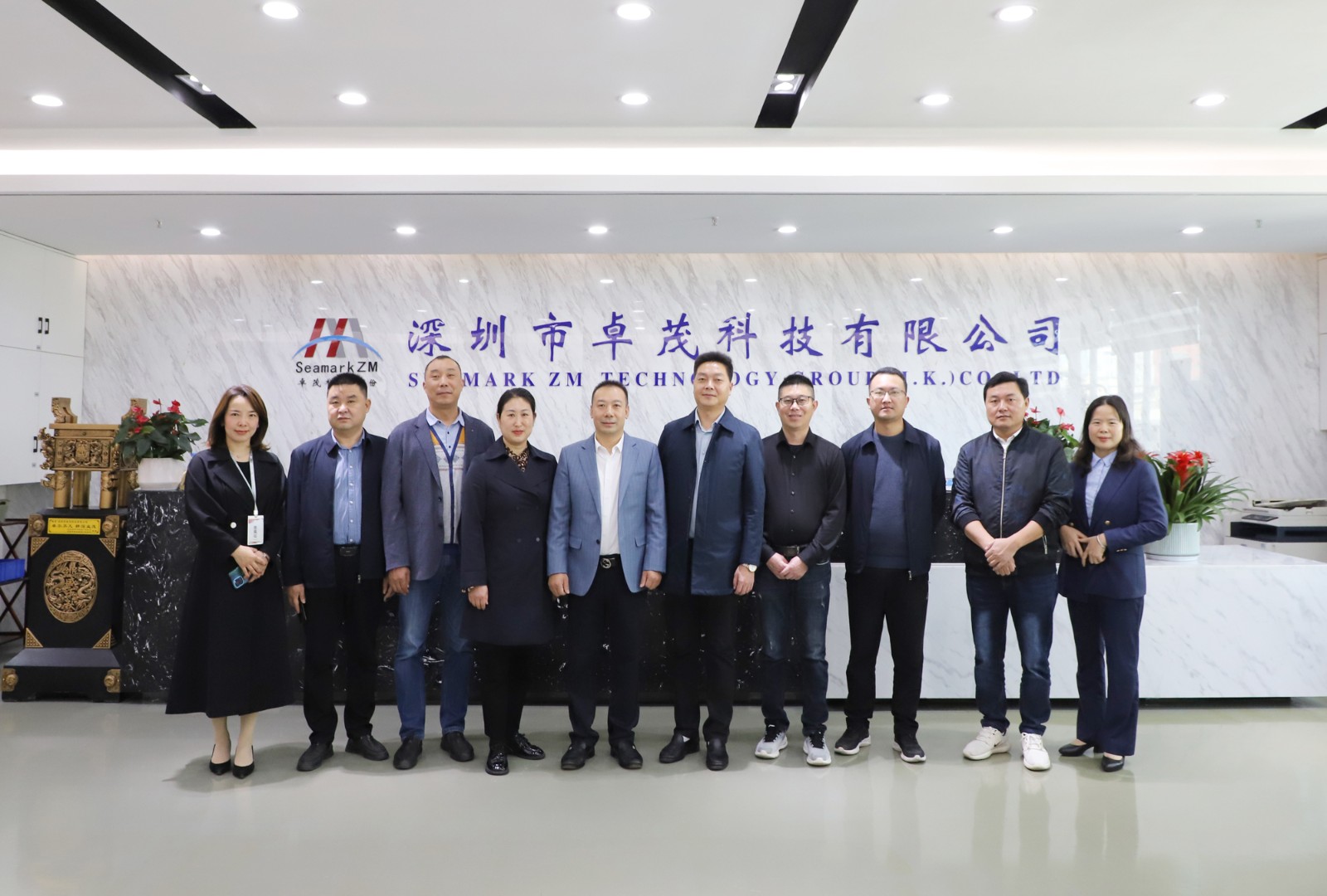 聞總與湖北省?？悼h政府副縣長龔夫一行合影.jpg